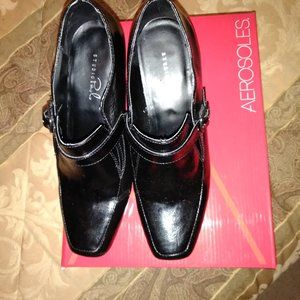 Shoes, suits, purse and gown.
